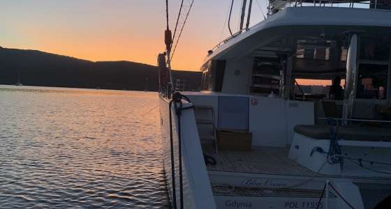 Catamaran Lagoon 560 at the sunset